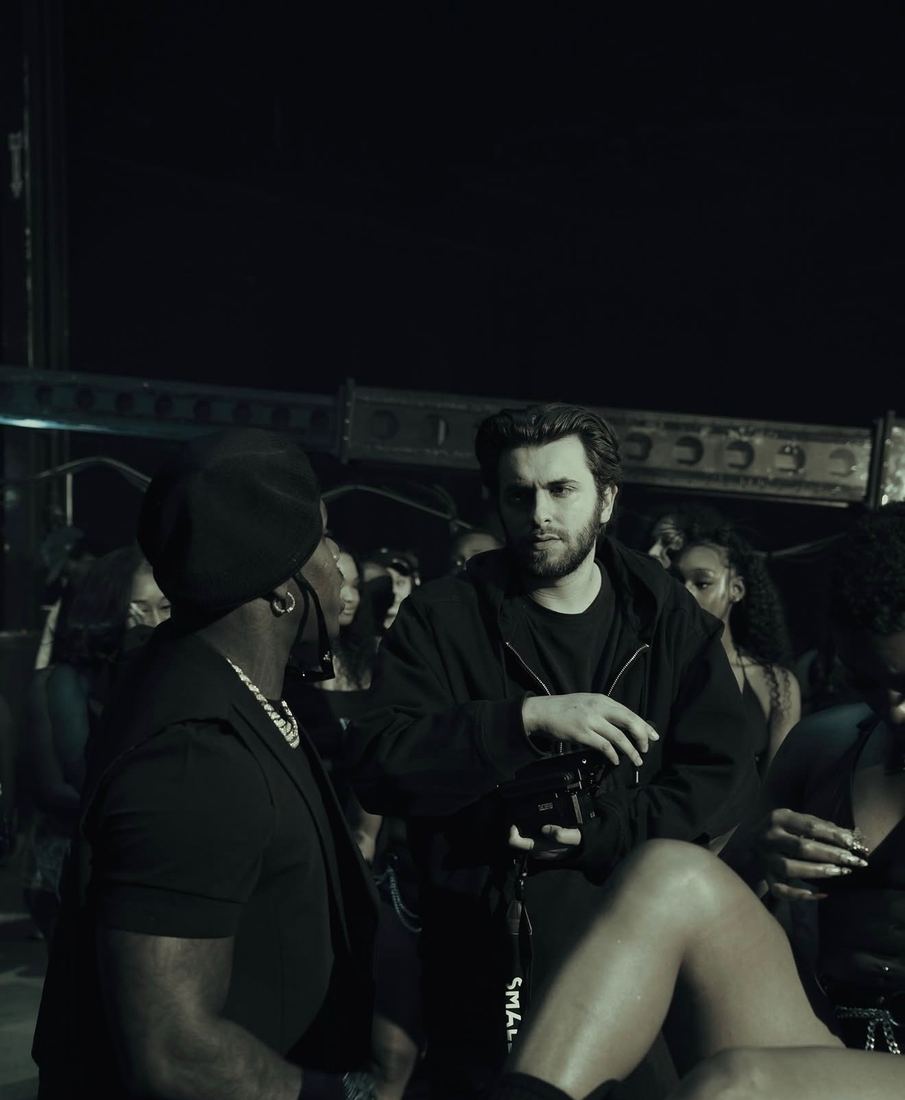 Directing an artist on set between takes