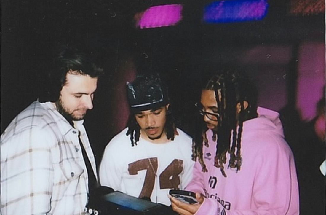 Polaroid of reviewing playback with artists