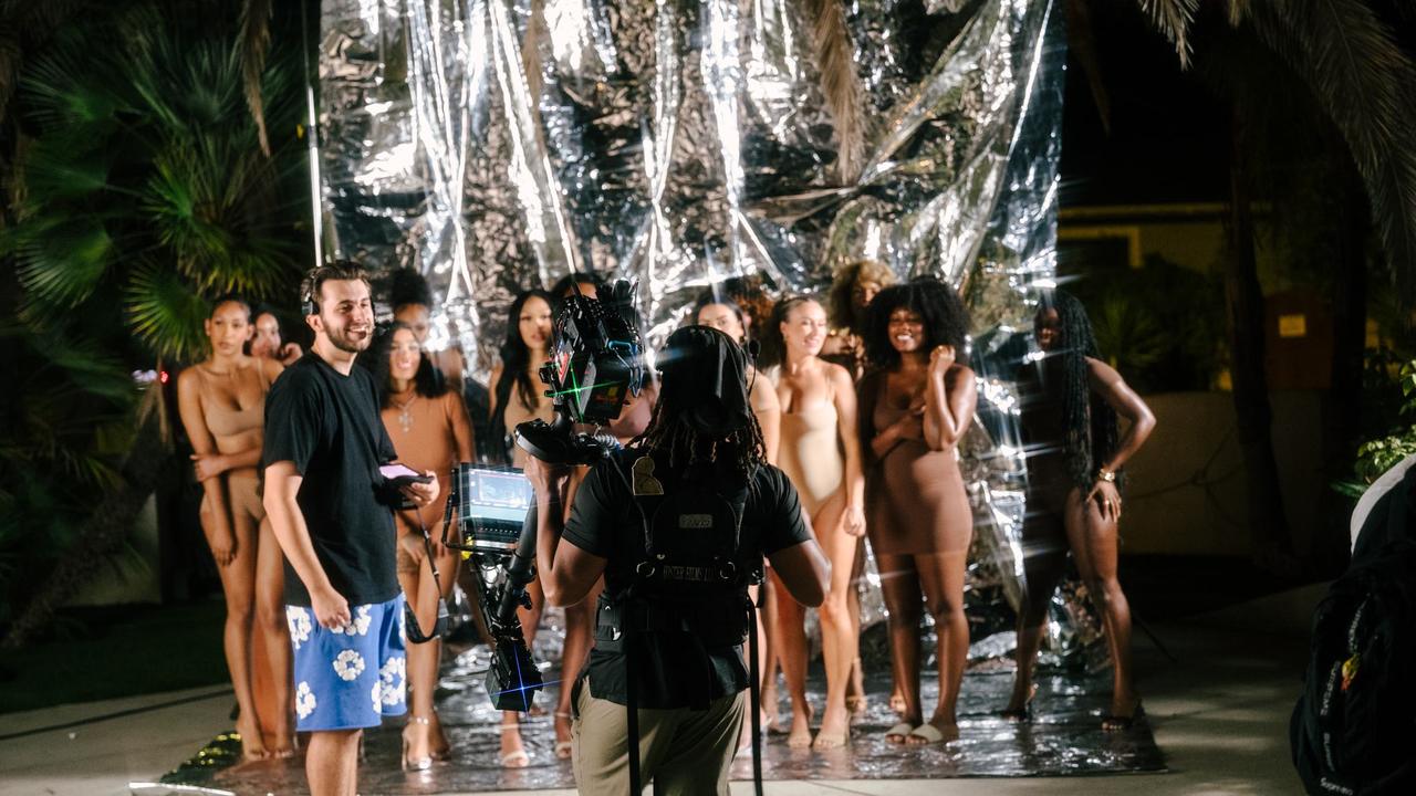 On set with the camera operator and cast